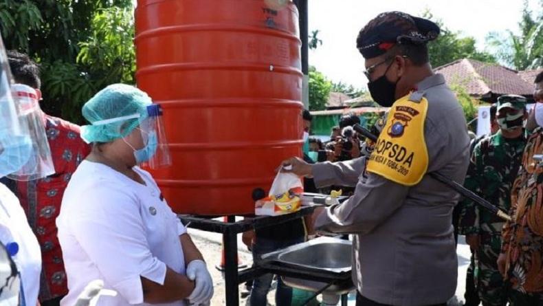 Meredam dan Mencegah Penyebaran Virus Corona, Kapolda Sumut Meresmikan Kampung Paten di Kabupaten Deliserdang