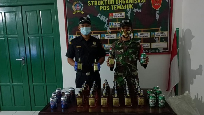 TNI Kembali Amankan 10 TKI Ilegal dan Miras Selundupan dari Malaysia