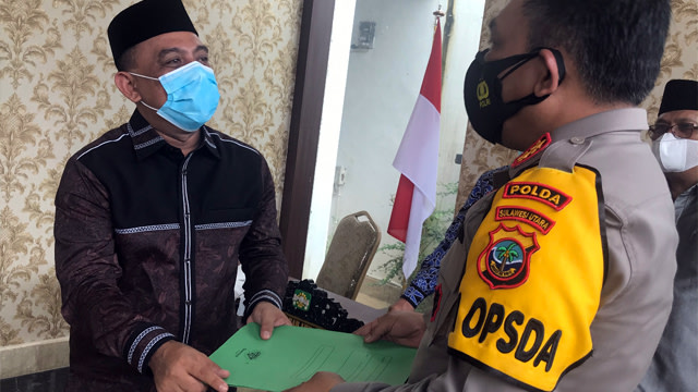 GP Ansor Serahkan Bukti Penghinaan Mantan Polisi terhadap Yaqut-Aqil ke Kapolda Sulut