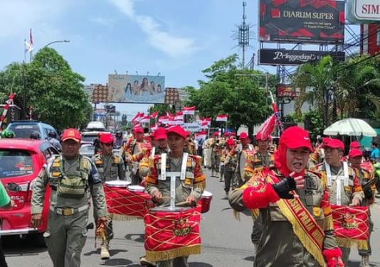 Korps musik satpol PP Kuningan Meriahkan Acara Kirab Merah Putih