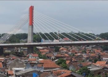 MENATA KOTA TANPA PETA JALAN