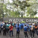 Ratusan Personil Selamatkan Wisata Waduk Darma Dari Serangan Eceng Gondok